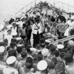 The ship's company look on as the presentations proceed.