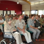 The audience watch the presentations at the Arboretum