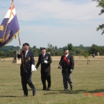 The standard bearers open the ceremony of remembrance