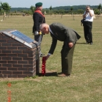 Boy McCall lays the DunSoc wreath