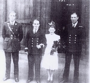 Tempy. Instr. Lt. G.D. L. Harcombe BSC with his Bride and - left Capt. H.R.Maul, R.M. - and temporary Captain, E.C. Thornton DSC